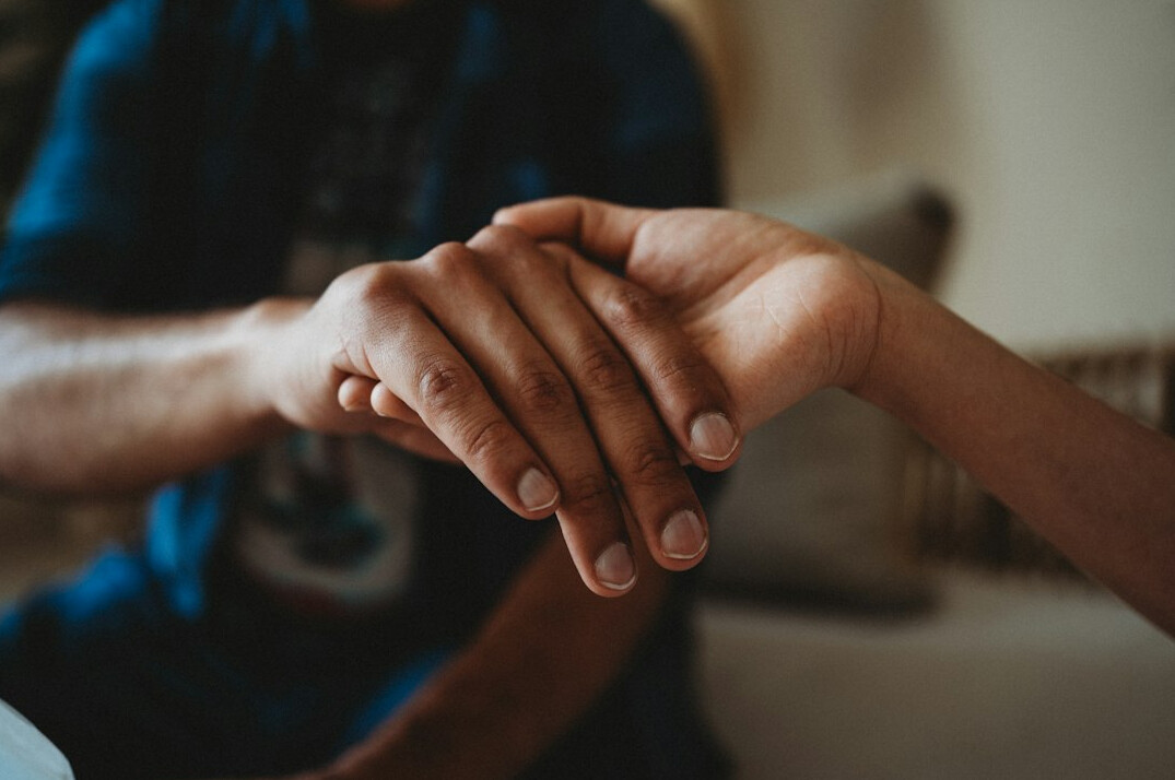 Close up of a handshake between an advisor and a client